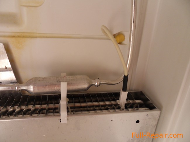 The output of the evaporator and the temperature sensor